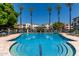 Inviting community pool with surrounding lounge chairs at 3302 N 7Th St # 208, Phoenix, AZ 85014