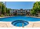 Inviting pool and spa area with lounge chairs at 3302 N 7Th St # 208, Phoenix, AZ 85014