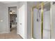 Bathroom with a shower/tub combo and gold-toned fixtures at 3436 E Vaughn Ave, Gilbert, AZ 85234