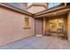 Small front patio with two chairs, near the front entrance at 3436 E Vaughn Ave, Gilbert, AZ 85234