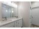 Bathroom with double vanity and a walk-in shower at 3515 N Tewa Cir, Eloy, AZ 85131