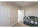 Bedroom with crib and plenty of space at 3515 N Tewa Cir, Eloy, AZ 85131