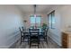 Dining area with a table and chairs, offering natural light at 3515 N Tewa Cir, Eloy, AZ 85131