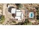 Aerial view showing a large home, pool, and desert landscaping at 36445 N 14Th St, Phoenix, AZ 85086