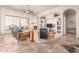 Spacious living room featuring a fireplace and built-in shelving at 36445 N 14Th St, Phoenix, AZ 85086