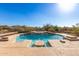 Inviting backyard pool with spa and waterfall feature at 36445 N 14Th St, Phoenix, AZ 85086