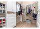 Large walk-in closet with ample shelving and hanging space at 36445 N 14Th St, Phoenix, AZ 85086