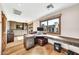 Bright home office featuring wood floors, custom built-ins, and a large window offering scenic views at 4022 E Stanford Dr, Phoenix, AZ 85018