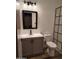 Updated bathroom with gray vanity, black fixtures, and a walk-in shower at 409 W Pontiac Dr # 8, Phoenix, AZ 85027