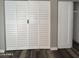 Two large closets with white louvered doors and modern hardware at 409 W Pontiac Dr # 8, Phoenix, AZ 85027