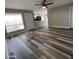 Living room with wood-look flooring and neutral walls at 409 W Pontiac Dr # 8, Phoenix, AZ 85027