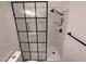 Modern shower with frameless glass enclosure and built-in shelving at 409 W Pontiac Dr # 8, Phoenix, AZ 85027