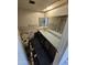 Bathroom with double vanity, tile flooring, and tub at 4132 N 89Th Ln, Phoenix, AZ 85037