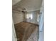 Spacious carpeted bedroom with window and closet at 4132 N 89Th Ln, Phoenix, AZ 85037