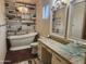 Elegant bathroom featuring a soaking tub, unique vanity, and stylish accents at 42424 N Gavilan Peak Pkwy # 23102, Anthem, AZ 85086