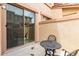 Private patio area with sliding glass door, perfect for outdoor relaxation and entertaining at 42424 N Gavilan Peak Pkwy # 23102, Anthem, AZ 85086