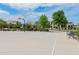 Community basketball court with bench and surrounding homes at 4627 S Grenoble Cir, Mesa, AZ 85212