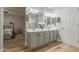 Double vanity bathroom with modern gray cabinets at 4627 S Grenoble Cir, Mesa, AZ 85212