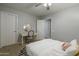 Bedroom with a vanity table and queen-size bed at 4627 S Grenoble Cir, Mesa, AZ 85212