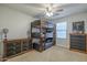 Bedroom with a wooden bunk bed and ample floor space at 4627 S Grenoble Cir, Mesa, AZ 85212