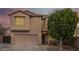 Two-story house with a large garage and mature landscaping at 4627 S Grenoble Cir, Mesa, AZ 85212