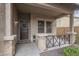 Inviting front porch with stone accents and a decorative doormat at 4627 S Grenoble Cir, Mesa, AZ 85212