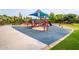 Community playground with shade structures and play equipment at 4627 S Grenoble Cir, Mesa, AZ 85212