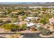 House with pool and spa, surrounded by desert landscape, mountain views at 4706 E Rancho Caliente Dr, Cave Creek, AZ 85331