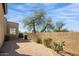 Landscaped backyard with gravel and desert plants at 4706 E Rancho Caliente Dr, Cave Creek, AZ 85331