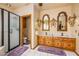 Bathroom features double sinks, shower, and large mirrors at 4706 E Rancho Caliente Dr, Cave Creek, AZ 85331