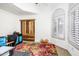 Home office with barn door and white brick wall at 4706 E Rancho Caliente Dr, Cave Creek, AZ 85331