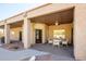 Covered patio with seating area, ceiling fan and access to pool at 4706 E Rancho Caliente Dr, Cave Creek, AZ 85331