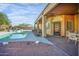 Inviting pool area with covered patio and seating at 4706 E Rancho Caliente Dr, Cave Creek, AZ 85331