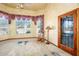 Sunroom with rocking chair and pool view at 4706 E Rancho Caliente Dr, Cave Creek, AZ 85331