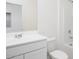 Simple, clean bathroom with white vanity, toilet, and bathtub at 47665 W Cansados Rd, Maricopa, AZ 85139