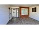 Covered porch with brick accent wall and tiled flooring at 4829 E Lake Point Cir, Phoenix, AZ 85044