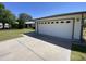 Two-car garage with a wide driveway at 4829 E Lake Point Cir, Phoenix, AZ 85044