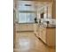 Bright kitchen with white cabinets and tile floor at 4829 E Lake Point Cir, Phoenix, AZ 85044