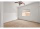 Bedroom with ceiling fan and window coverings at 5211 W Maldonado Rd, Laveen, AZ 85339