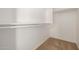 Well-lit closet with double hanging rods and shelving at 5211 W Maldonado Rd, Laveen, AZ 85339