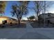 Scenic walking path, mature trees, and well-maintained landscaping at 5211 W Maldonado Rd, Laveen, AZ 85339