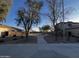 Scenic walking path, mature trees, and well-maintained landscaping at 5211 W Maldonado Rd, Laveen, AZ 85339