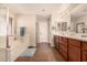 Bathroom boasts double vanity and a relaxing bathtub at 581 W Reeves Ave, San Tan Valley, AZ 85140