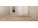 Spacious bedroom with carpet and built-in closet at 581 W Reeves Ave, San Tan Valley, AZ 85140