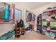 Large walk-in closet with shelves and hanging rods at 581 W Reeves Ave, San Tan Valley, AZ 85140