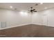 Spacious bedroom with hardwood floors and double doors at 616 E Country S Plz, Gilbert, AZ 85234