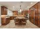 Open kitchen boasts granite counters and island at 616 E Country S Plz, Gilbert, AZ 85234