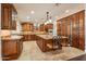 Gourmet kitchen with granite countertops and island at 616 E Country S Plz, Gilbert, AZ 85234