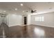 Spacious living room with hardwood floors and recessed lighting at 616 E Country S Plz, Gilbert, AZ 85234