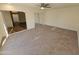 Spacious bedroom featuring carpeted floors and mirrored closet at 620 S Laveen Dr, Chandler, AZ 85226